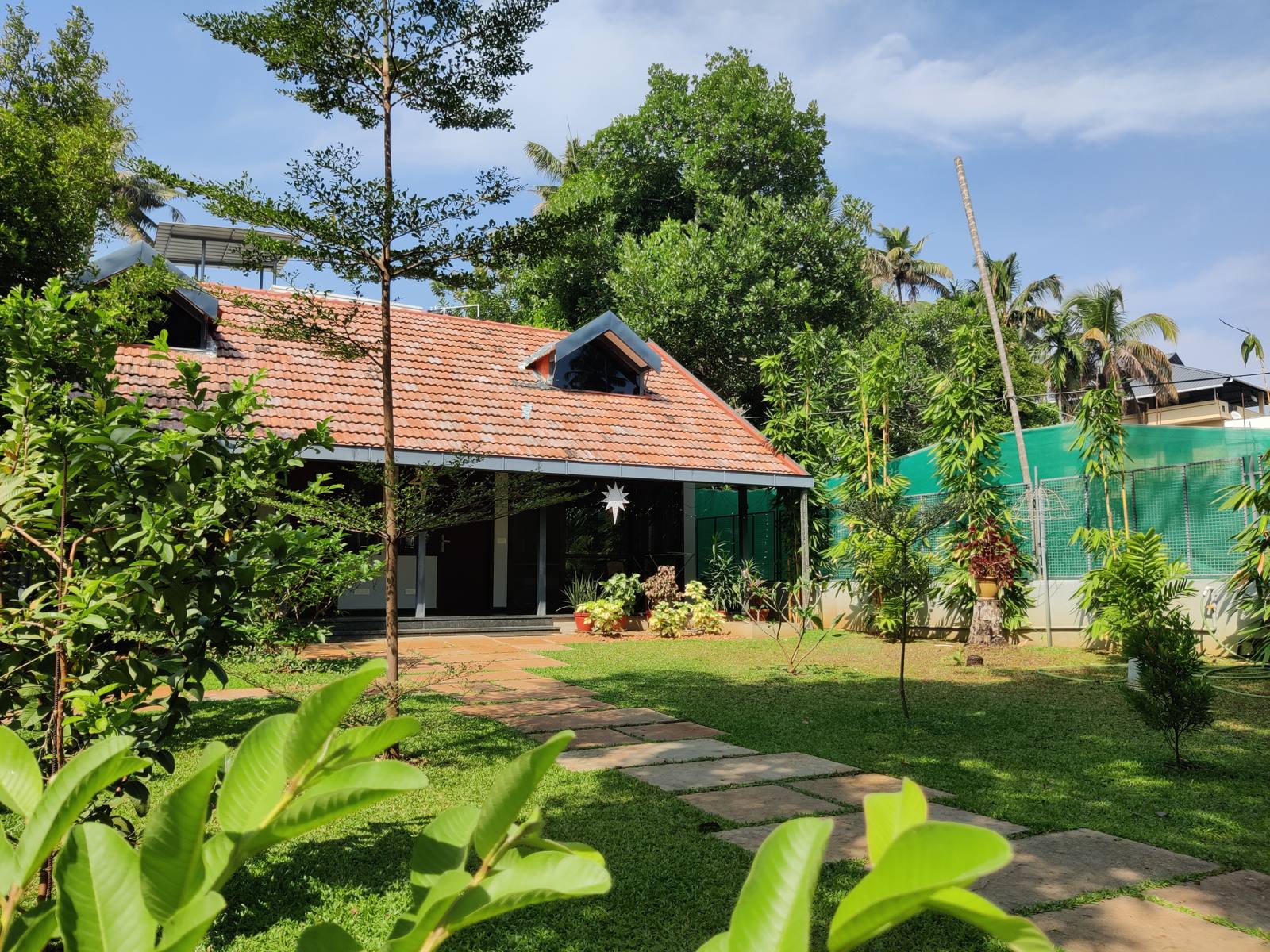 Cottage and garden on a sunny morning